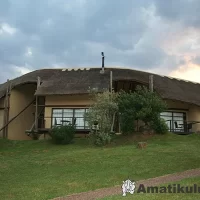 Didima Camp six‑bed self‑catering chalet with garden view in the Drakensberg