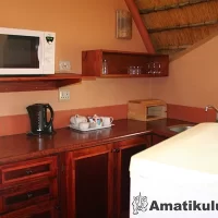 Kitchen in chalet at Didima Camp – self-catering accommodation with modern amenities in Drakensberg, KwaZulu-Natal, South Africa