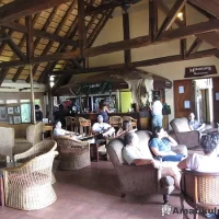 Bar area at Hilltop Camp offering drinks and relaxation with views of the surrounding wilderness in Hluhluwe-iMfolozi Game Reserve, South Africa