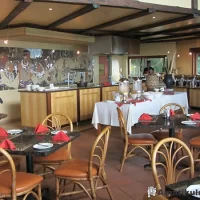 Buffet dining area at Hilltop Camp with views over the African bushveld in Hluhluwe-iMfolozi Game Reserve, South Africa