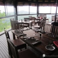 Restaurant at Hilltop Camp offering indoor and outdoor dining with panoramic views in Hluhluwe-iMfolozi Game Reserve, South Africa