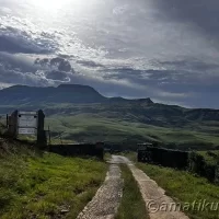 Entrance gate to Injisuthi Camp in uKhahlamba-Drakensberg Park, welcoming visitors to the mountainous wilderness of KwaZulu-Natal, South Africa