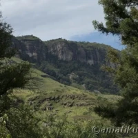 Hilltops surrounding Injisuthi Camp with panoramic views of the Drakensberg mountains in uKhahlamba-Drakensberg Park, South Africa