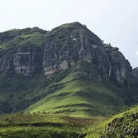 Majestic mountain peaks surrounding Injisuthi Camp in uKhahlamba-Drakensberg Park, offering breathtaking views and natural beauty in South Africa