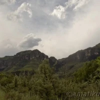 Breathtaking views from Injisuthi Camp showcasing the surrounding Drakensberg mountains and lush valleys in uKhahlamba-Drakensberg Park, South Africa