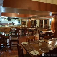 Restaurant at Ntshondwe Camp in Ithala Game Reserve offering indoor and outdoor dining with views of the KwaZulu-Natal wilderness