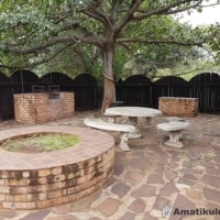 Outdoor braai area at Ndumo Game Reserve set in a tranquil bush environment for self-catering guests in KwaZulu-Natal, South Africa